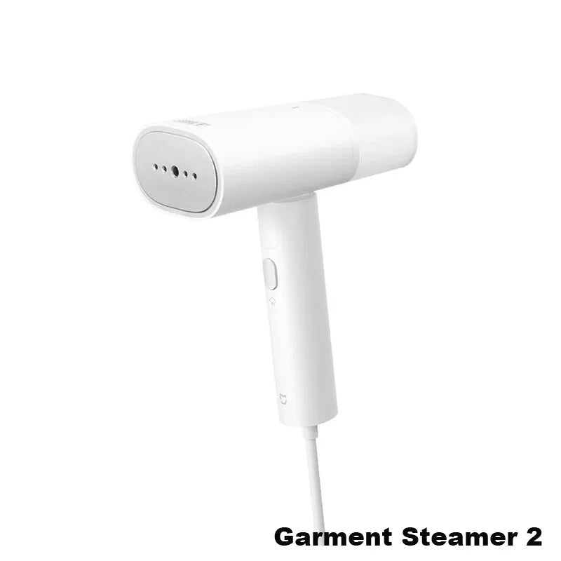 A white compact foldable handheld garment steamer with a long cord.