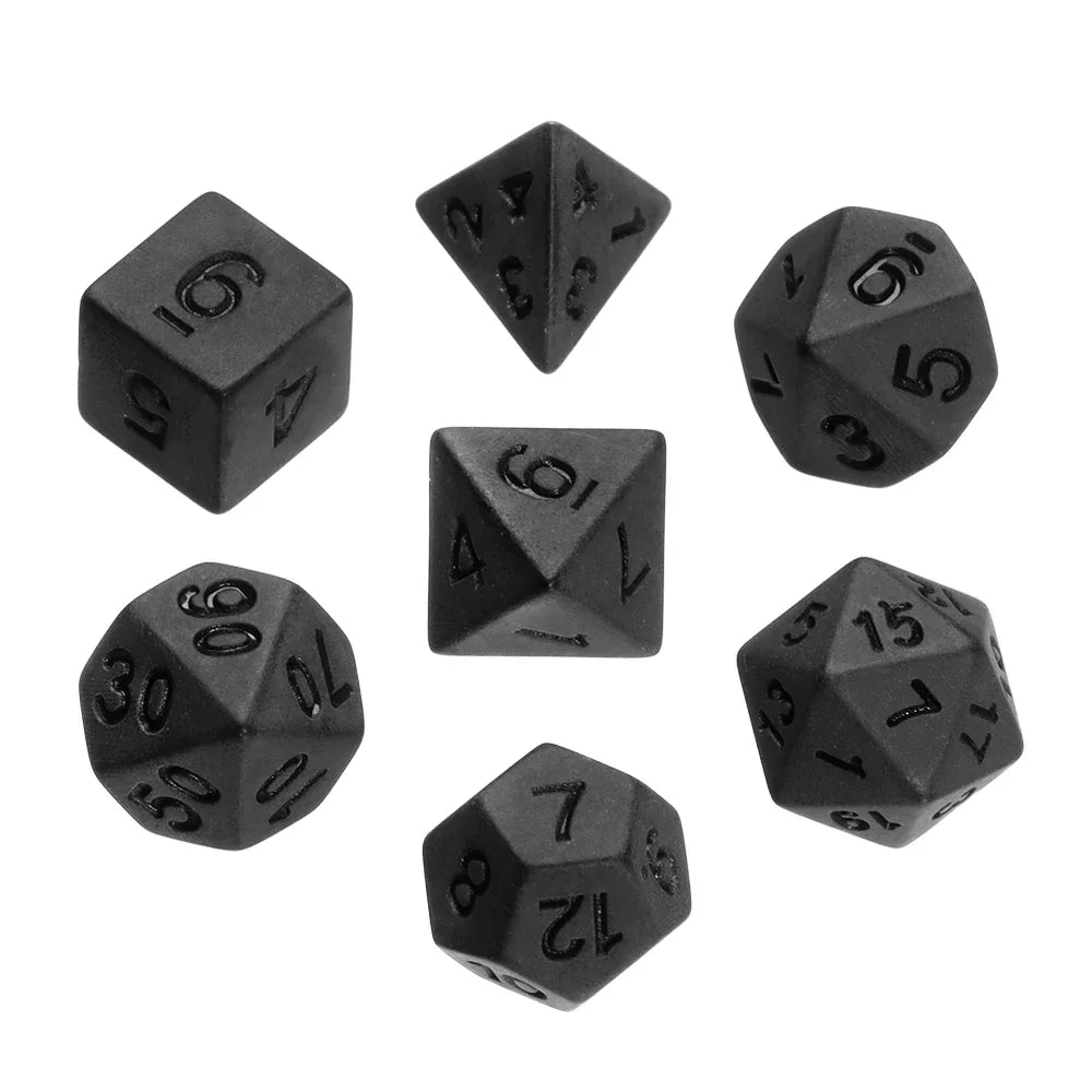 A set of matte black polyhedral dice including a d10, d6, d8, d12, and d20.