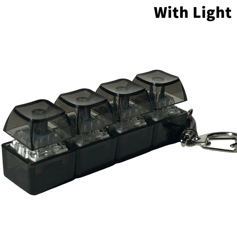 Black LED mechanical keychain fidget toy with custom keycaps and light.