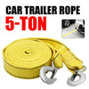 Yellow car trailer rope rated for 5 tons with metal hooks rolled into a coil.