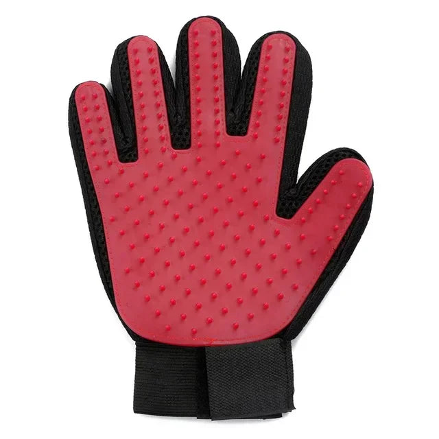 A pair of bright pink silicone pet grooming gloves with textured palms and black wrist cuffs.