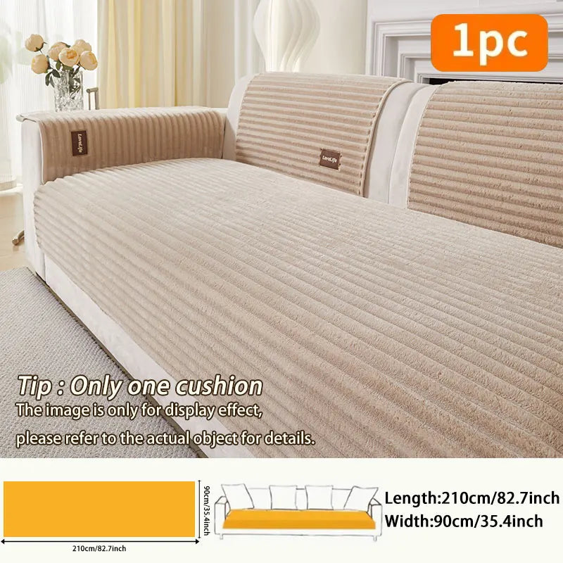 A beige non-slip minimalist sofa cushion cover shown on a light-colored sofa with matching striped pillow covers.