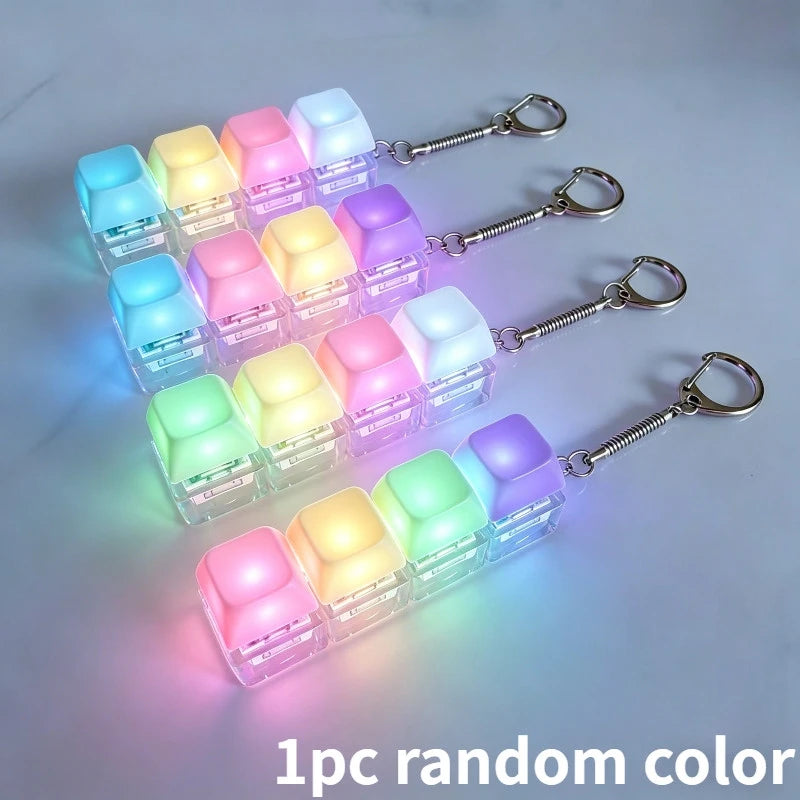 A set of 12 translucent LED macaron-shaped fidget toys with metal clasps and random colors.
