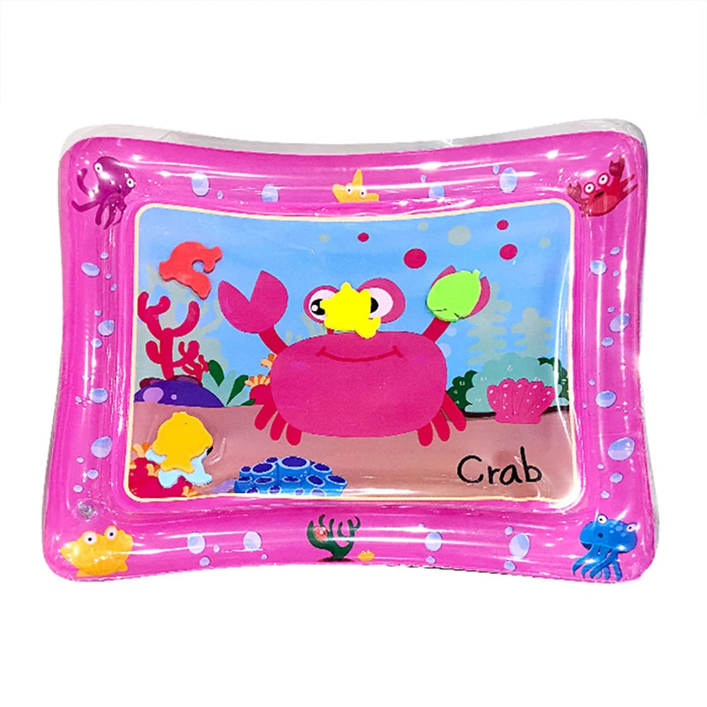 Pink inflatable baby water play mat with floating sea creatures and a crab toy