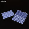 A transparent multi-compartment storage box with fixed dividers, shown in a flat and open view.