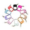 A collection of colorful silicone protective cases for hand sanitizer spray attached to a keyring.