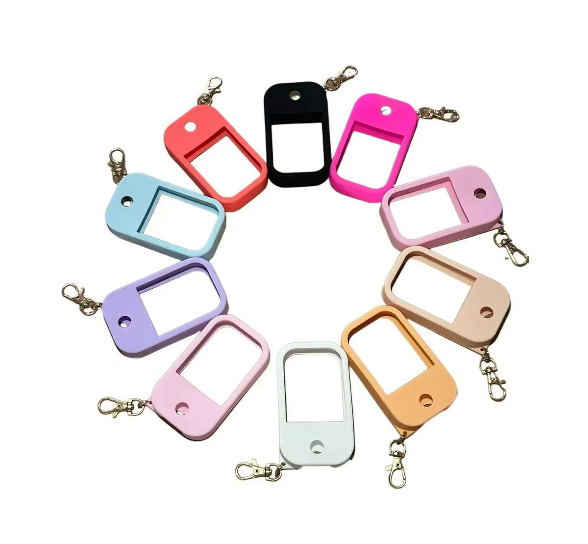 A collection of colorful silicone protective cases for hand sanitizer spray attached to a keyring.