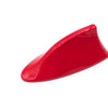 A bright red universal car shark fin antenna cover for FM/AM signal enhancement.