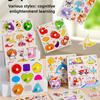 A collection of puzzle pairing grip boards and a wooden life cycle puzzle set for children.