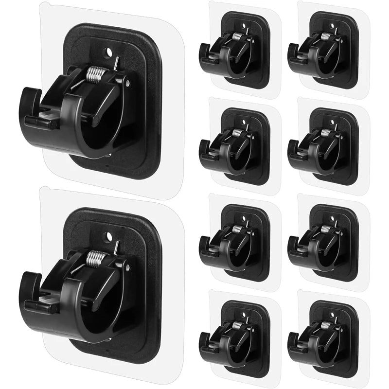 A set of two black self-adhesive no-drill curtain rod brackets for mounting hardware.