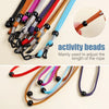 A collection of colorful activity beads used to adjust the length of a rope or lanyard.