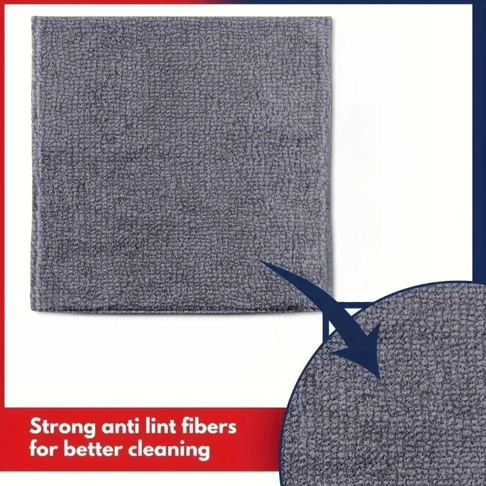 A gray kitchen cleaning towel is shown with an arrow pointing to its strong anti lint fibers for better cleaning.