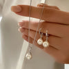 Ensemble de bijoux pendentif en perles dorées vintage
