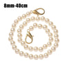 A delicate gold-toned pearl chain strap measuring 8mm to 40cm.