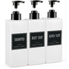 A three-pack of white refillable soap dispenser bottles with black pump tops and labels for shampoo, body soap, and hand soap