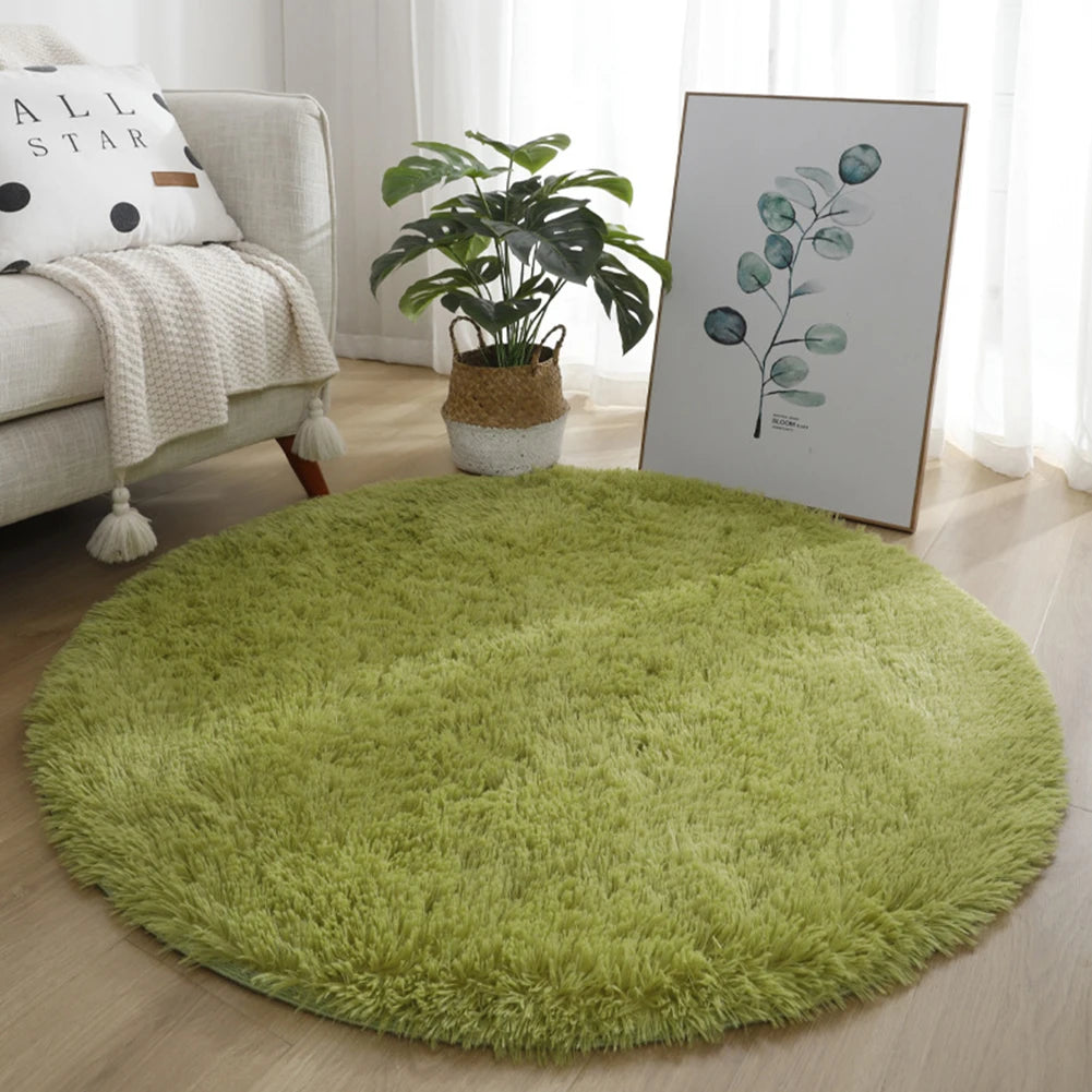 A round, bright green shaggy rug placed on a light wood floor in a living room setting.