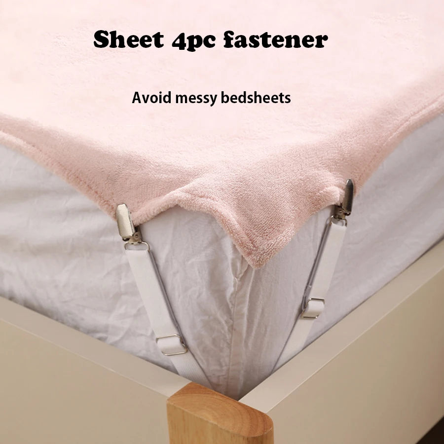Vier rosa Befestigungen zum Fixieren von Bettlaken und zur Ordnung auf einem verstellbaren Bett.