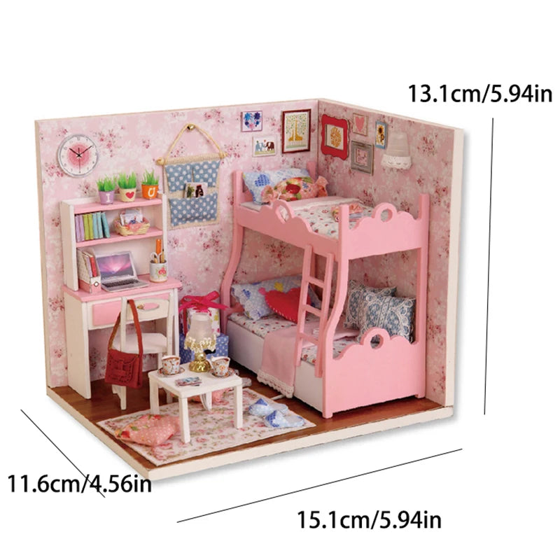 A pink wooden miniature dollhouse kit featuring a bed, shelves, and decorative elements for crafting.