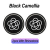 Two black camellia pattern coasters with rhinestone borders