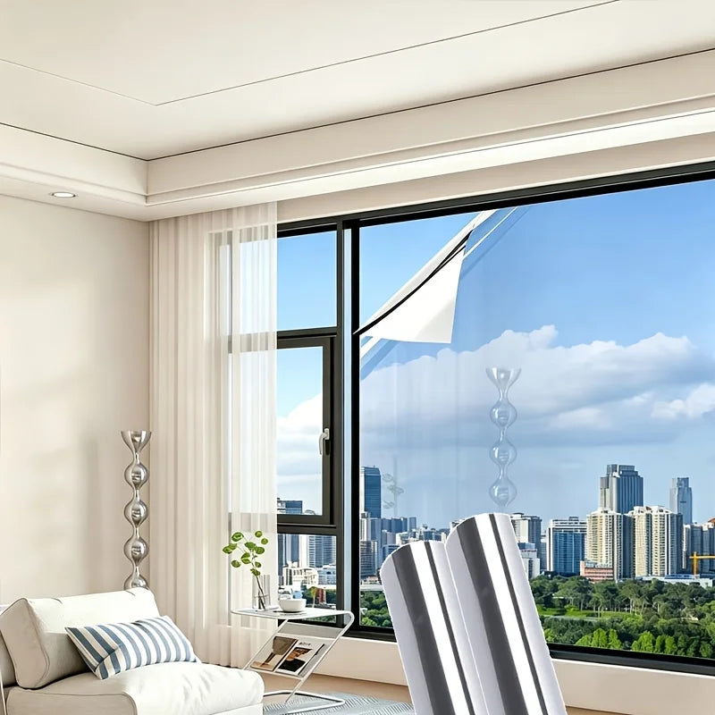 Frosted privacy window film installed on a large glass window overlooking a city skyline.