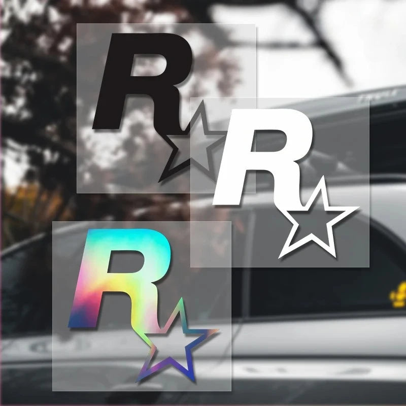 A close-up of a car featuring multiple reflective R-star decals on the body and window.