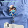 2D acrylic flat nurse figurine with a mask and cap displayed on a blue fabric background.
