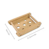 A light brown natural bamboo soap dish with multiple holes for fast-drying drainage.