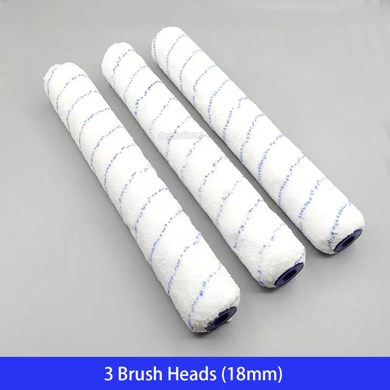 Three white paint brush heads with blue bristles are displayed on a gray background.