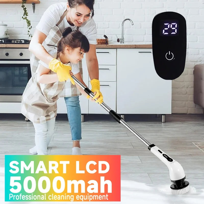 A woman is using a handheld electric spin scrubber with interchangeable brush heads to clean a kitchen surface.