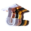 A set of durable curtain rod brackets in white, copper, and black finishes.