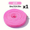 Pink windproof portable clothesline with anti-slip design rolled up for storage
