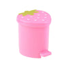 Pink mini strawberry trash can with a green pop-up lid