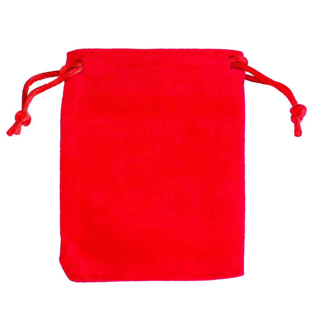 A bright red velvet drawstring jewelry pouch with red ties.