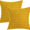 A mustard yellow corduroy throw pillow cover with a textured, quilted pattern.