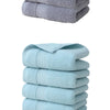 A stack of six light blue textured face towels