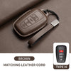 Brown leather cord with a key case cover and lanyard, matching leather for Toyota models.