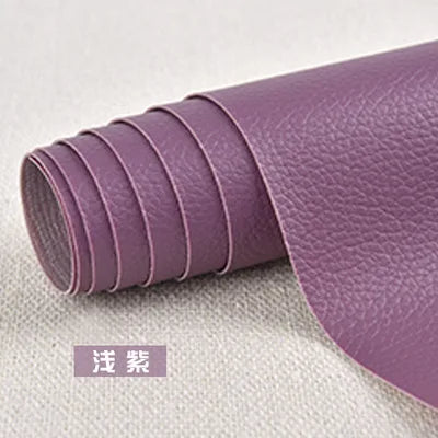 Roll of purple self-adhesive PU leather patch for furniture and craft repairs
