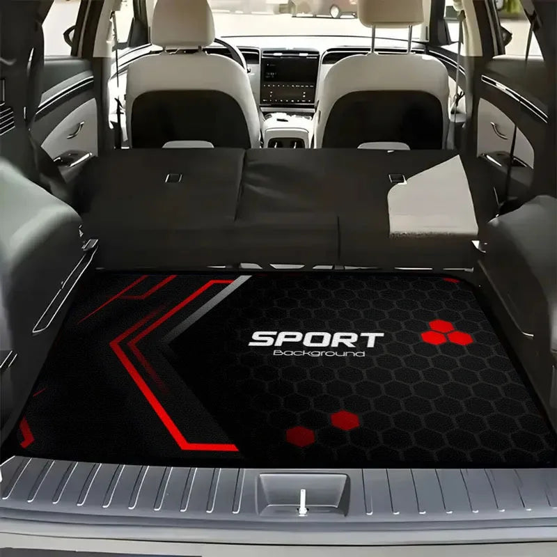 A black and red floor mat with a sport background is shown inside a car cabin.