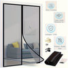 A sliding glass door with a mesh screen curtain installed for pest protection and ventilation.