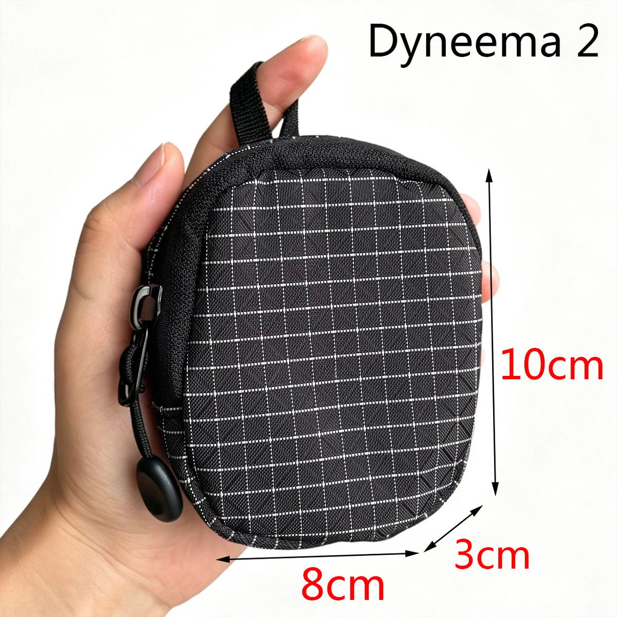 Black Dyneema 2 compact utility pouch shown being held, measuring 10cm high and 8cm wide.