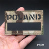 A rectangular tactical patch featuring a camouflage pattern with the word POLAND printed in dark lettering.