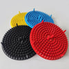Three silicone grit guard inserts in yellow, blue, and red are displayed on a white surface.