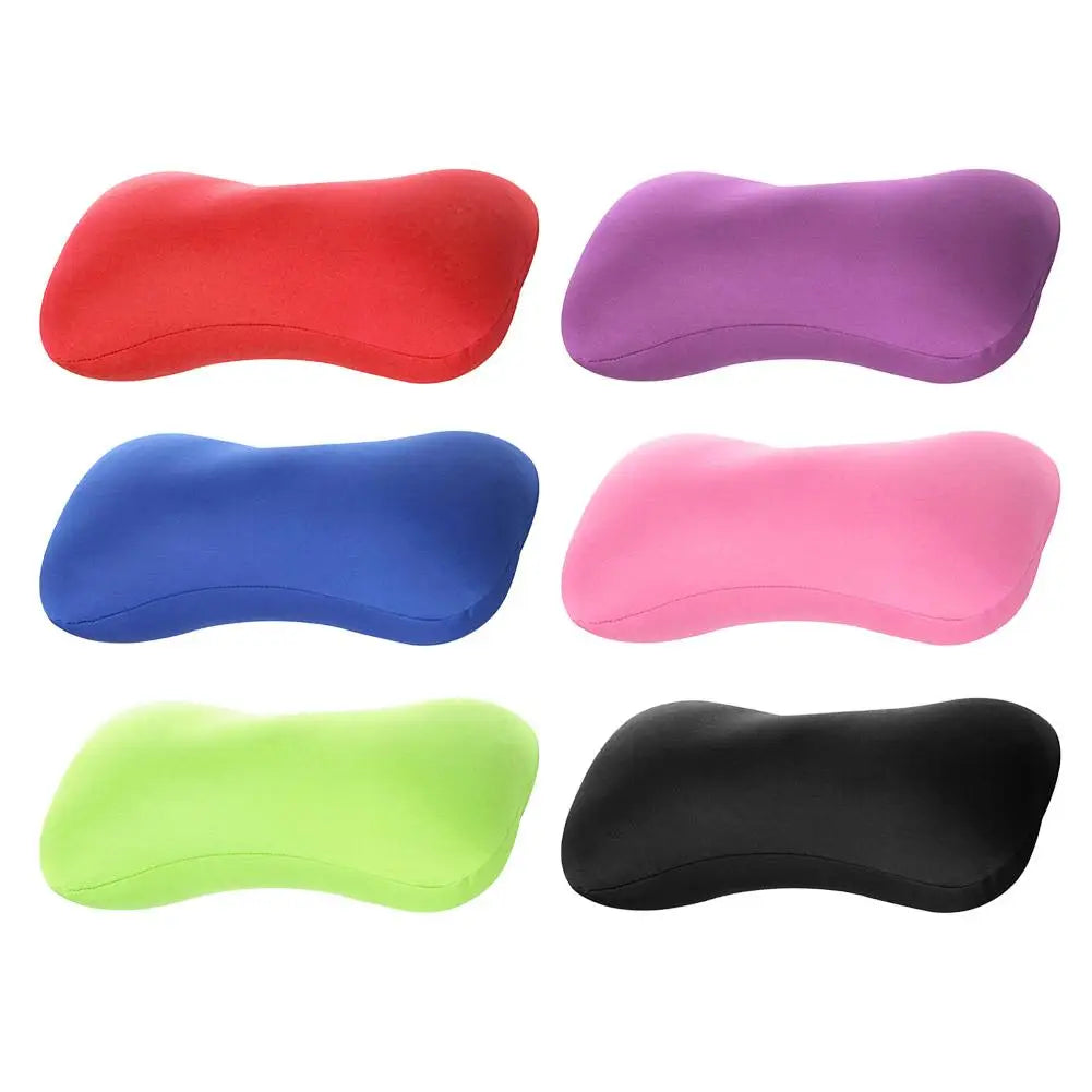 A set of five colored bolster pillows for neck and back support: red, purple, blue, pink, and lime green.