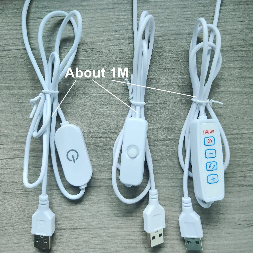 A white USB LED light board with a remote control and touch dimming feature, shown with its cables.