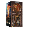 A wooden book nook kit featuring an enchanted owl bookstore design with built-in lighting and detailed miniature scenes.