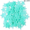 A pile of light blue glow-in-the-dark 3D star wall stickers for kids' rooms and bedrooms