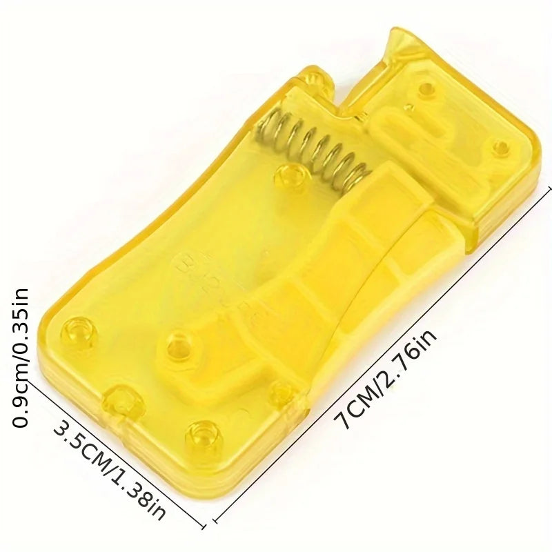 A yellow automatic needle threader tool with a coiled spring, shown from the side.