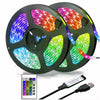 A set of two multicolor RGB LED light discs and a remote controller for lighting effects