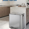 A stainless steel double trash can is shown on a kitchen counter next to wooden cabinetry.
