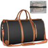 A dark gray duffel bag with brown leather accents and a clear mesh shoe pouch attached.